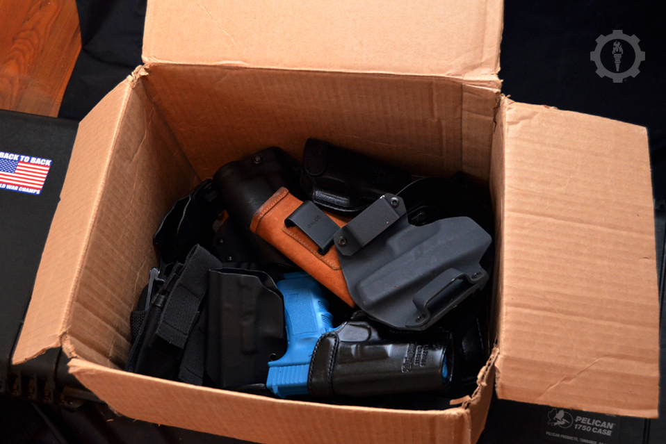 box full of poorly mad holsters